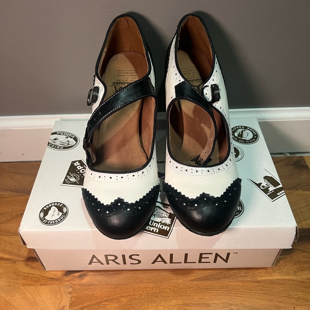 Black and White Spectator Heels with Wingtip Design